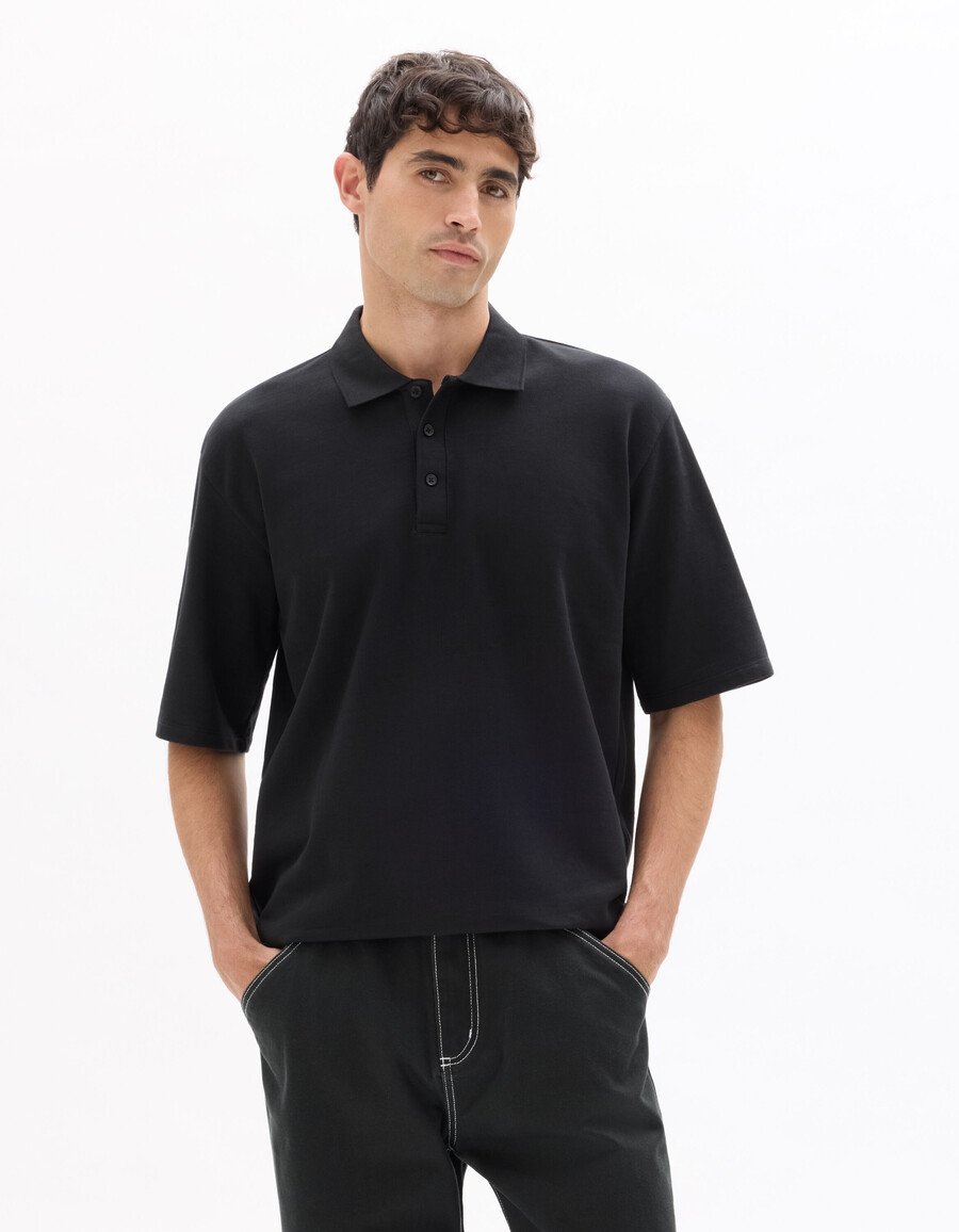 schwarzes oversize-polohemd aus 100 baumwoll-french-terry