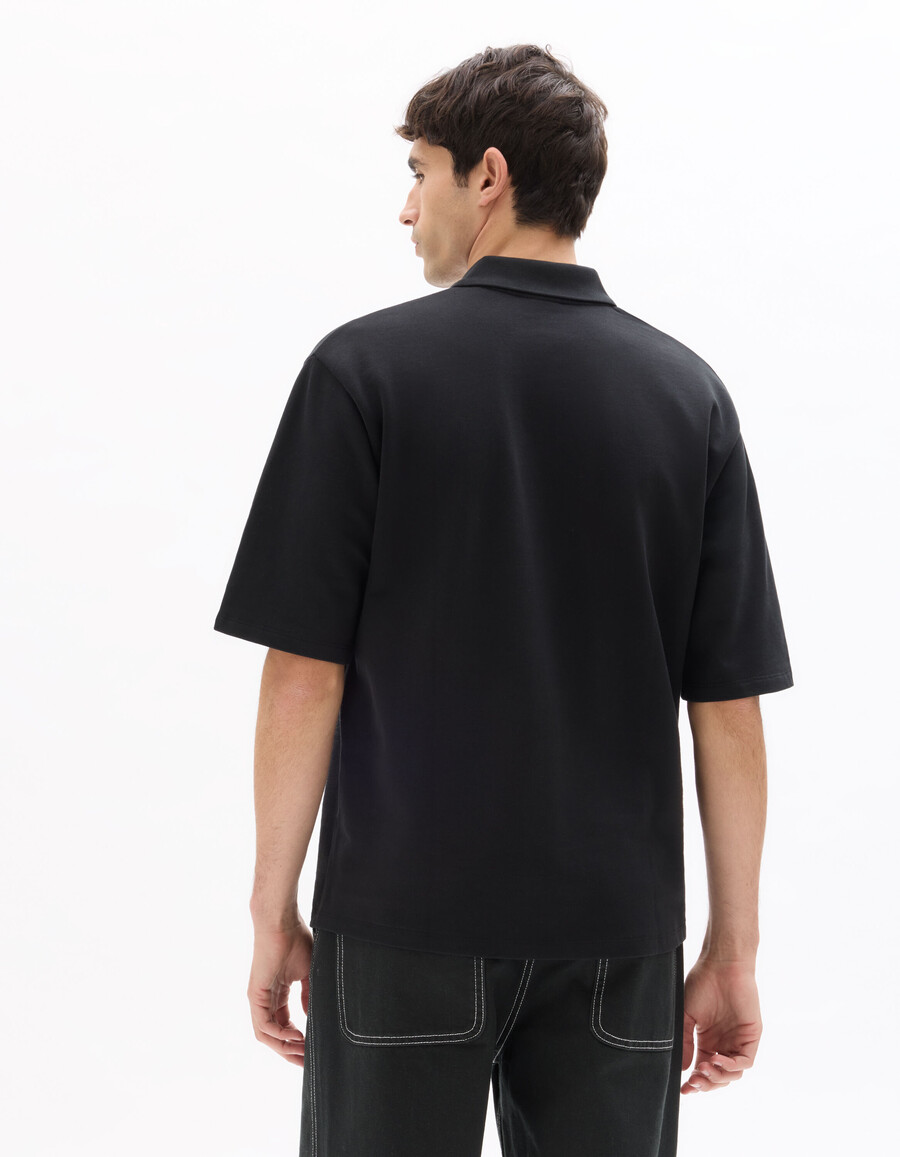 schwarzes oversize-polohemd aus 100 baumwoll-french-terry